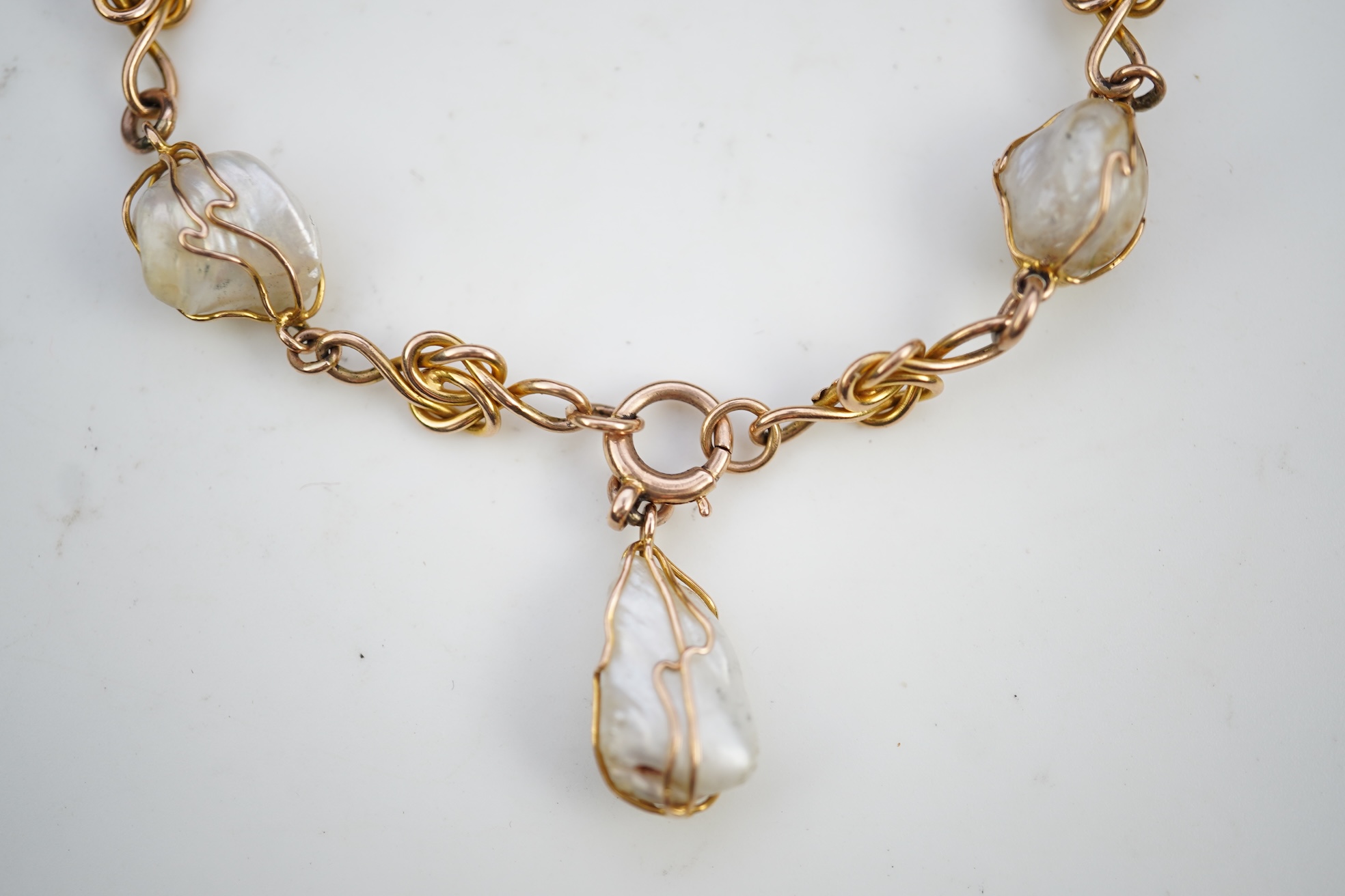 An unusual gold and pearl bracelet, early 20th century